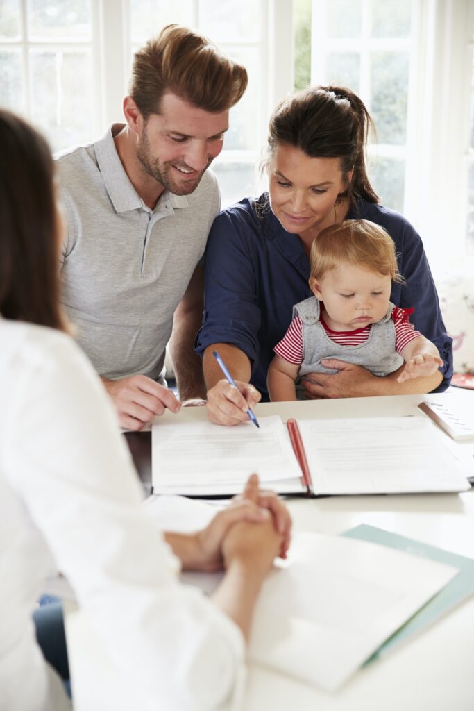 family-with-baby-meeting-financial-advisor-at-home