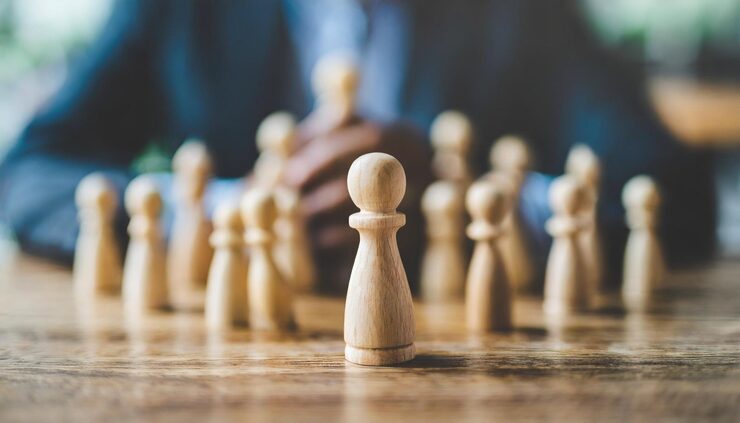 wooden-figure-stands-tall-diverse-group-symbolizing-leadership-unity-influence-col